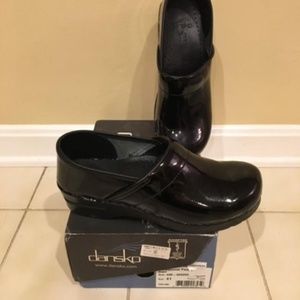 Patent black leather clogs.  Like New!